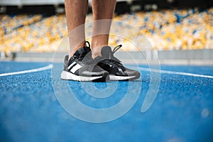 Close up of a male legs in sneakers standing