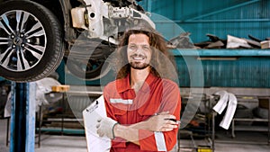 close-up male mechanic Caucasian, Standing touching own wound with plaster on head It was an accident that occurred while