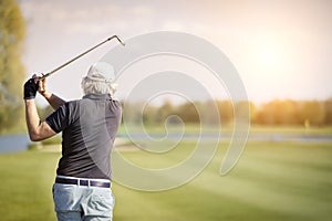 Close up of male senior golf player. photo