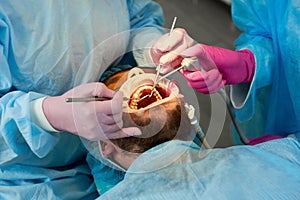 Close-up of man with beard during reception at dentist