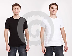 Close up of man in blank black and white t-shirt isolated on white background. Copy space and mock up.