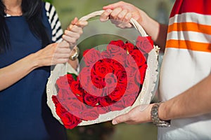 Close up man buys flowers in the flower shop