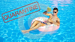 CLOSE UP: Man on cool spring break enjoys his pineapple drink while in a pool