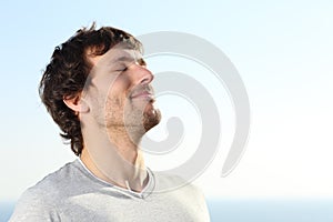 Close up of a man doing breath exercises outdoor