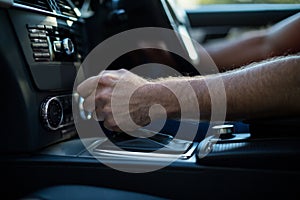 Close up of man driving car