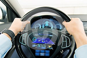 Close up of man driving car with gps navigator