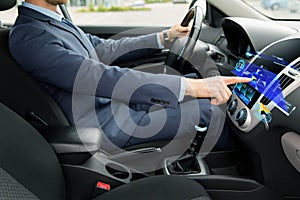 Close up of man driving car with navigation