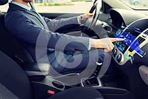 Close up of man driving car with navigation