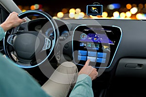 Close up of man driving car with navigation system