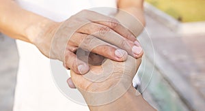 Close up of Man hand as Lending a helping hand as trust together with compassion concept