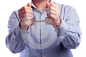 Close up of a man in handcuffs