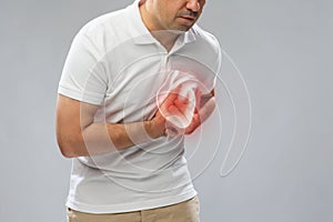 Close up of man having heart attack or heartache
