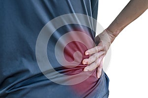 Close up of a man holding his back in pain,