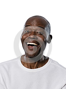 Close-up of man laughing in studio