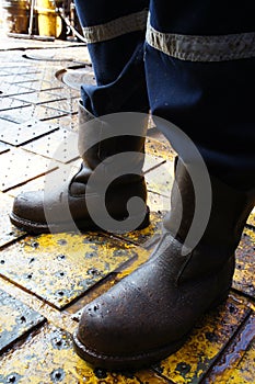 Close Up of Man Legs Standing on The Rig Floor