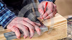 Experienced carpenter work with wooden