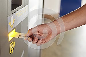 Close Up Of Man Paying For Car Parking At Machine