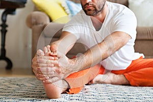 Close Up. Man practicing yoga and meditation at home. A series of yoga poses. Lifestyle concept