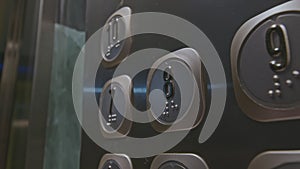 Close up of man pressing elevator button of the eight floor. Stock clip. Finger presses the elevator button.