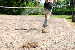 Close-up Of A Man Running Through Soil