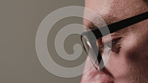 Close-up of a Man`s Face Against a Black Background