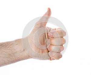 close-up of a man& x27;s hand with a raised thumb up on a white background, the concept of positive decision making, victory