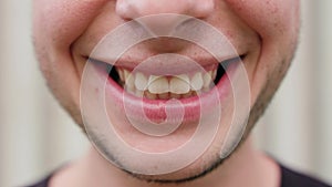 Close-up of a Man`s Mouth Smiling