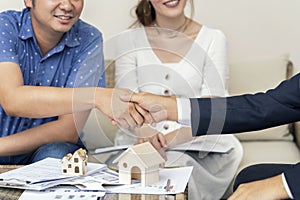 Close up, Man shaking hands represent sale, Asian couple meeting financial adviser for home, real estate purchase, success