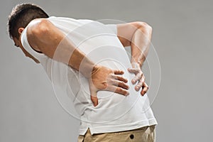 Close up of man suffering from backache