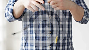 Close up of man untangling wires