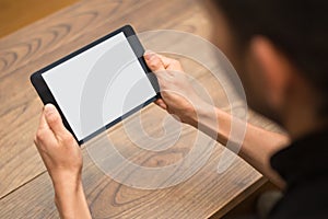 Close-up of a man using a digital tablet