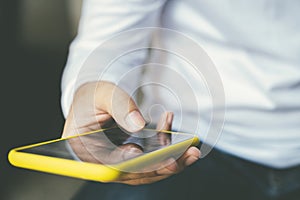 Close up of man using mobile phone