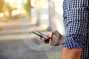 Close up of man using mobile smart phone