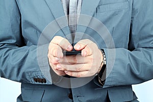 Close up of a man using mobile smart phone