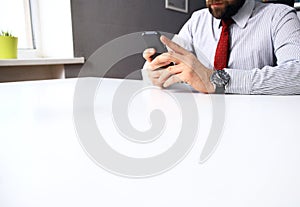 Close up of man using mobile smart phone