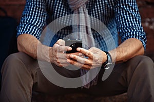 Close up of man using mobile smart phone