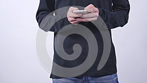 Close up of man using mobile smart phone isolated on white background