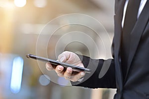 Close up of man using mobile smartphone.