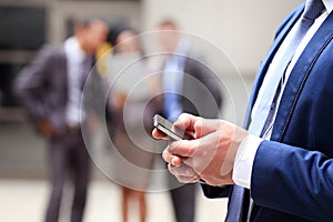 Close up of a man using smart phone