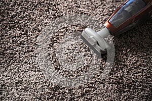 Close-up Of man using A Vacuum Cleaner professional vacuum clea