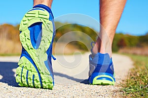 Close up of man walking in nature