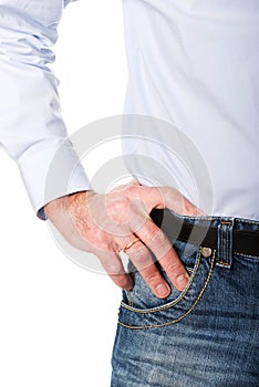 Close up man wearing jeans with hand on hip