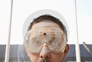 Close-Up Of Man Wearing Protective Goggles