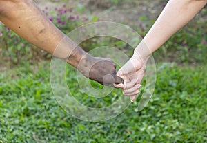 Close up man and woman hands touching holding together on blurred background for love valentine day concept, shake hand with a d