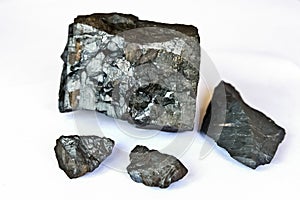 Close up of Manganese Ore on a white background
