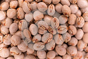 Close up of many pigeon peas in glass container