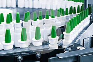 Close-up Many white plastic spray bottles for packaging liquid medicines in a pharmaceuti