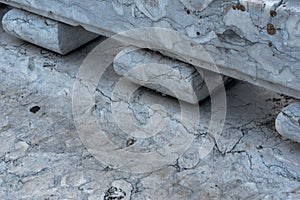 Close-up of marble bench with vein patterns and cracks