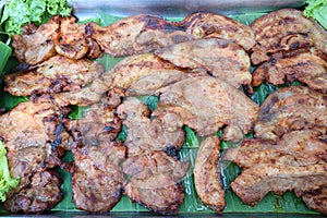 Close up, marinated pork neck, grilled herbs With green lettuce Thai style grill food