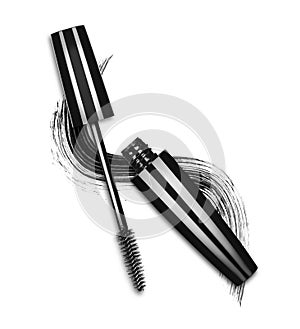 Close-up of mascara brush with black stroke on white background